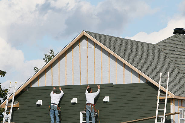 Professional Siding Installation technician working in Oakland, MD